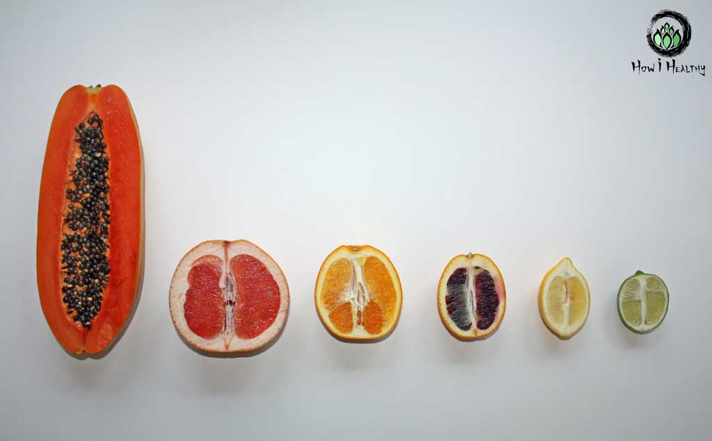 Sex Toy Greenwashing Citrus fruits cut in half and lined up by size.