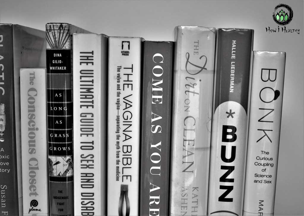 A row of books with titles along the spine.