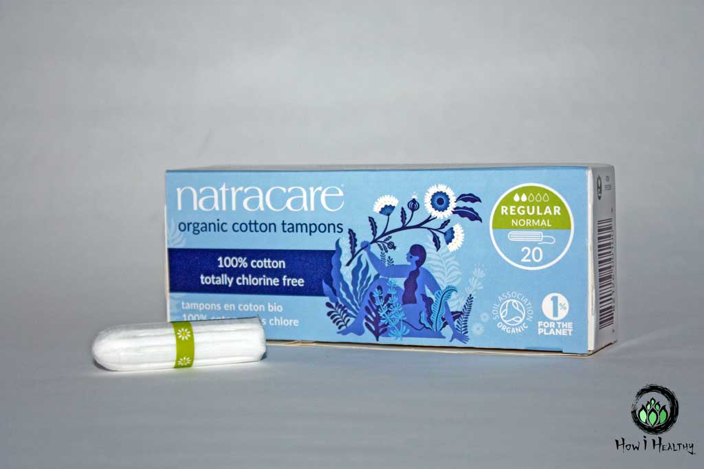 Natracare® tampons box with single cotton tampon beside it.