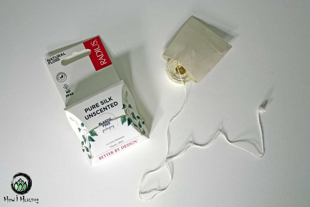 RADIUS® white silk floss with paper packaging.