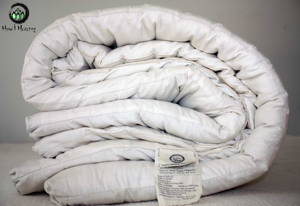 Folded in half Holy Lamb® wool comforter.