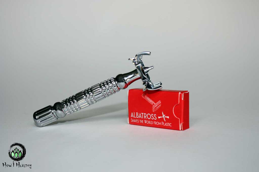 Albatross butterfly safety razor with red paper blade box.