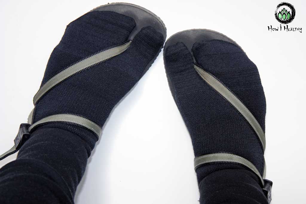 EarthRunners® minimalist sandals with black tabi socks.