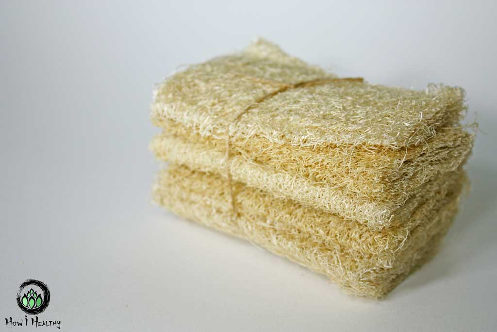 Set of dry loofah sponges tied together with twine.