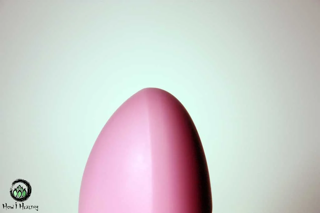 Sex toy brands pink silicone vibrator tip.