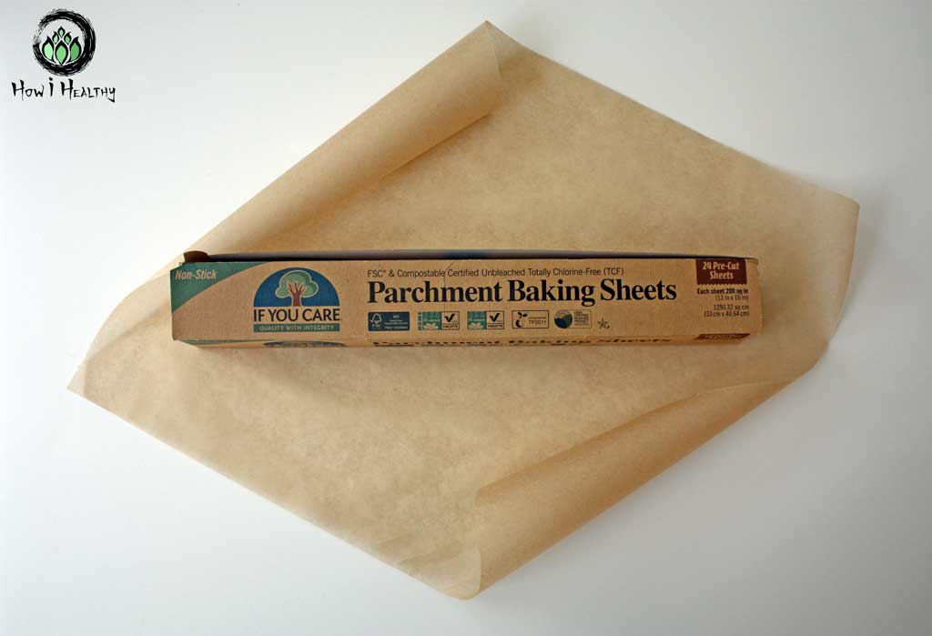 Unrolled baking parchment sheet on top of packaging box.