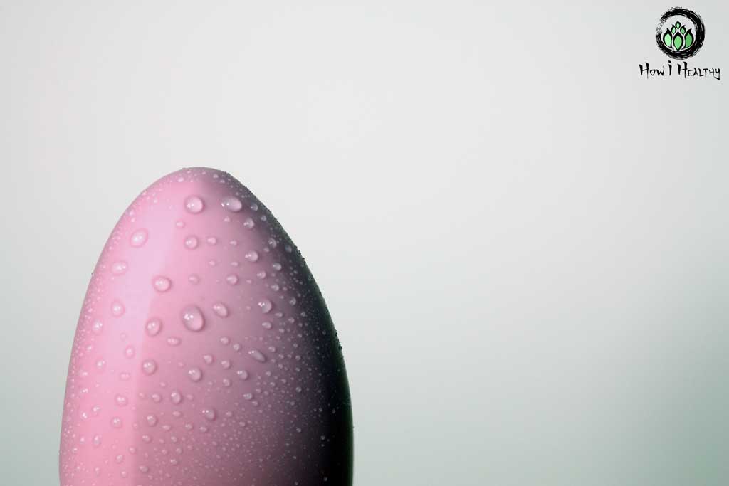 Wet pink silicone vibrator tip.