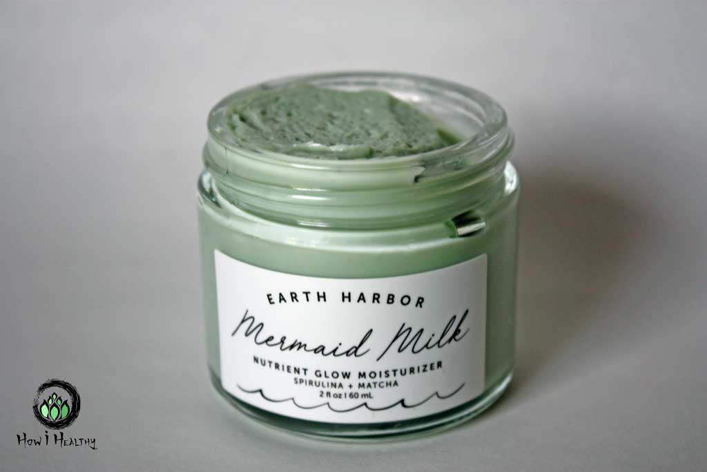 Mermaid Milk moisturizer in glass jar with no lid.