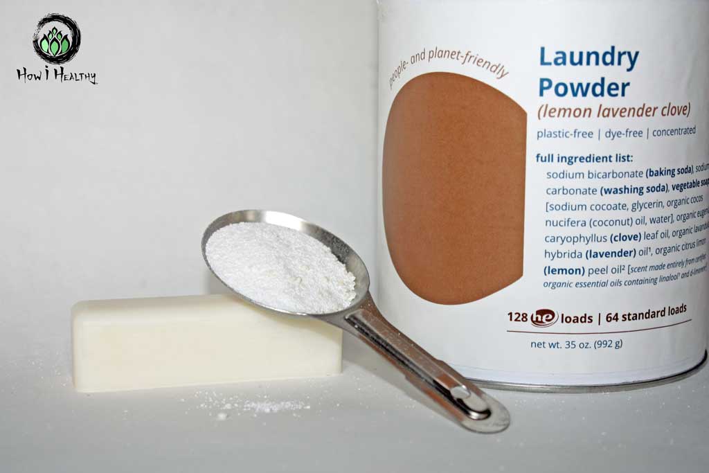 1 scope of natural laundry powder beside laundry stain stick.